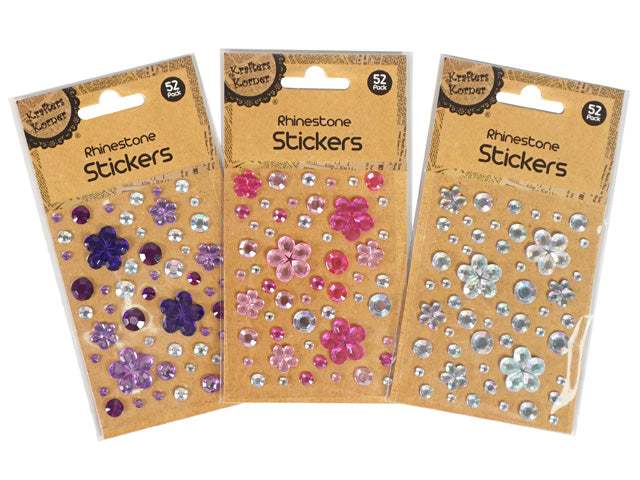 pack contains 52 rhinestone stickers; flower-shaped rhinestones; available in purple, pink, or clear colours; variety of sticker sizes; brown cardboard backing packaging;