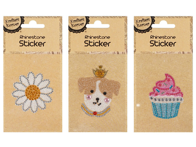 single sticker per pack; kraft paper backing card; three design options visible: flower, dog with crown, cupcake; stickers decorated with rhinestones and glitter; bright colours including white, gold, pink, blue and brown;