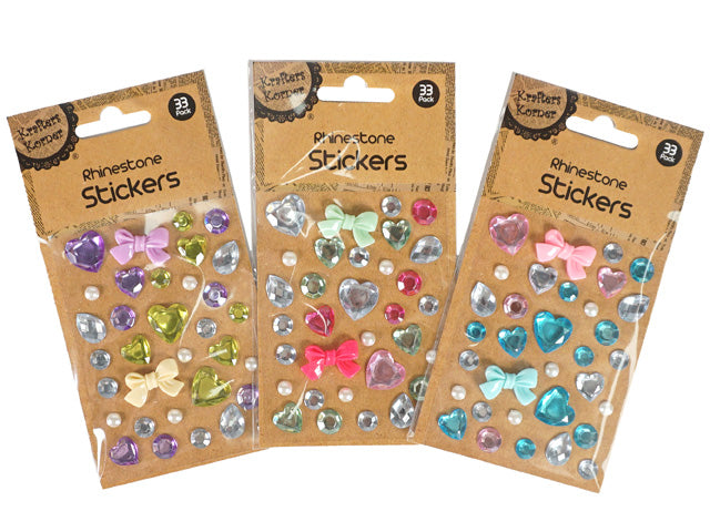 Multi-coloured rhinestone stickers; Bow shapes included; Heart and round rhinestone shapes; Pack of 33 stickers; Kraft paper backing packaging;