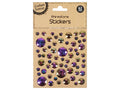 assorted round rhinestones in various sizes; purple and iridescent colours; faceted gem-like appearance; kraft paper backing card packaging;