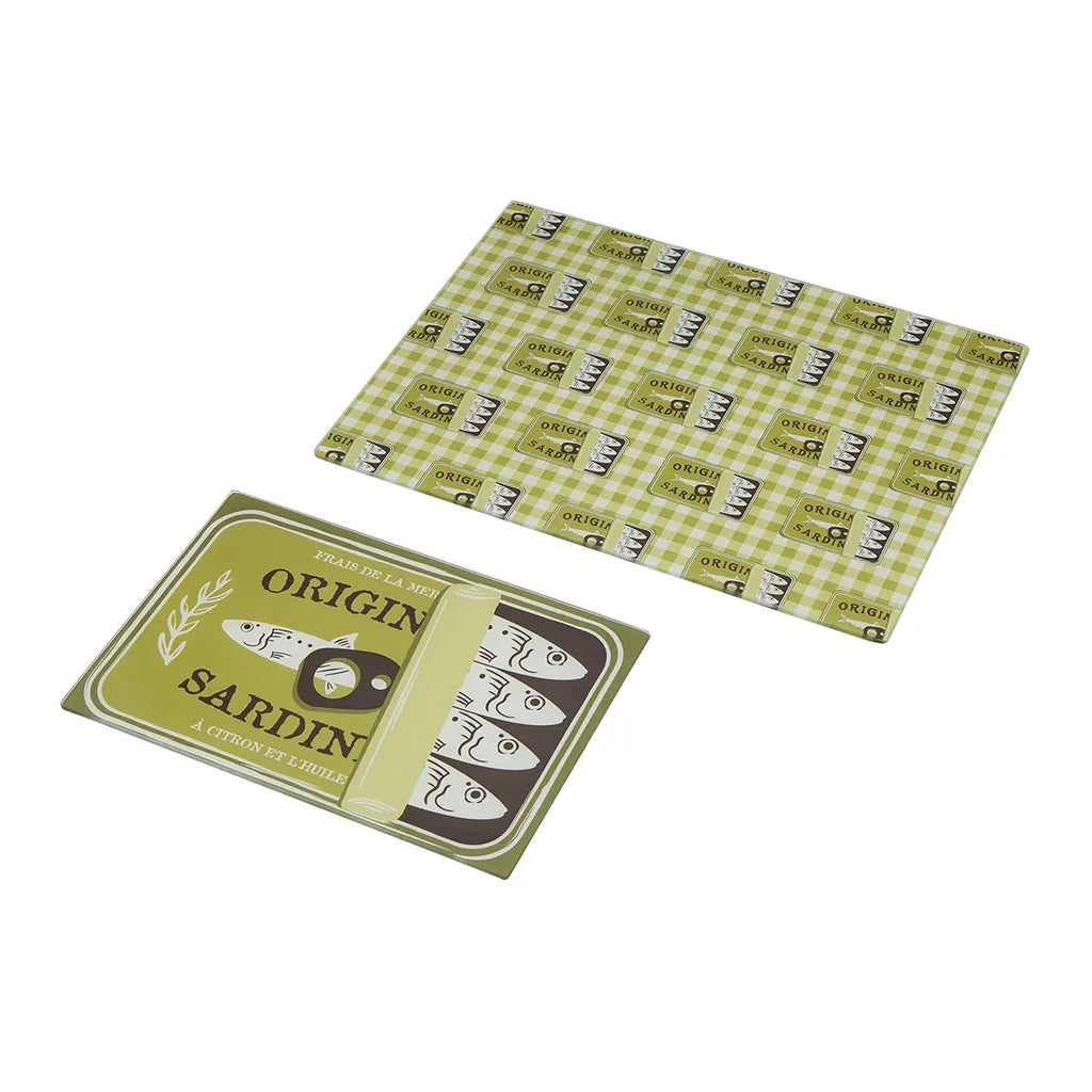 Two rectangular glass boards; Green and beige sardine-themed prints; One board shows sardines in a tin design; Other board has a checkered background with sardine tins;