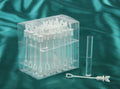 24 clear plastic tubes; white ribbed caps with butterfly design; square transparent storage box; long slender tube shape;