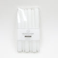 set of six white taper candles; packaged in clear plastic box; candles approx 20cm tall; label with product info on packaging;