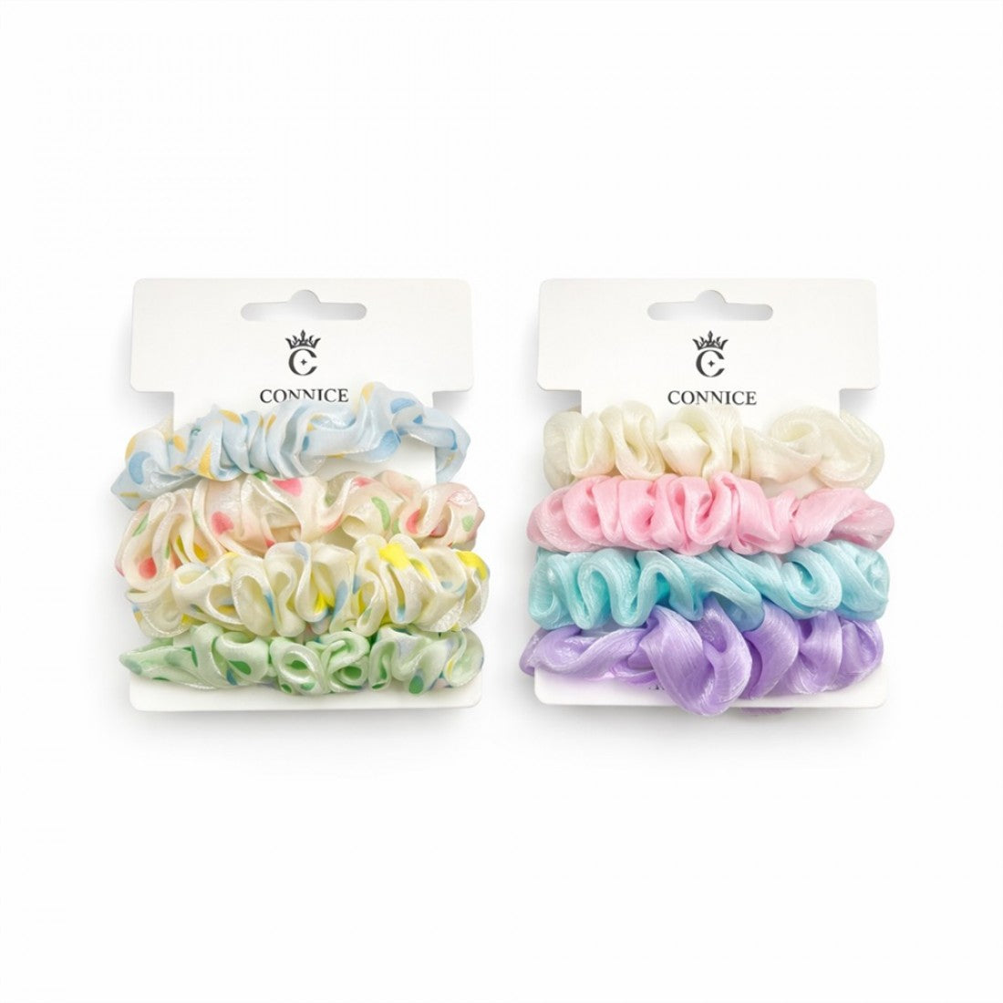 Sheer shiny organza fabric scrunchies; Soft pastel colours including blue, pink, purple, green and cream; Ruffled, voluminous scrunchie shape; Packaged on white branded backing cards;