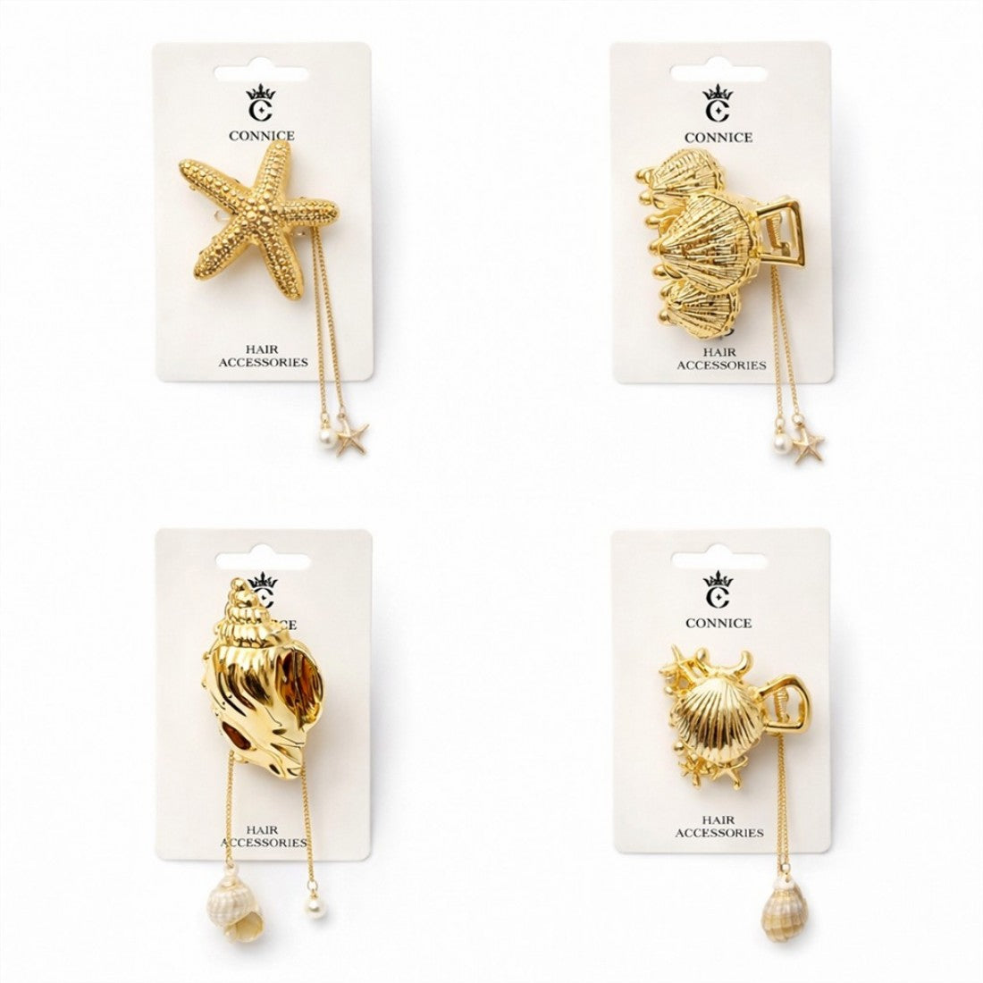 Gold-tone metal hair claws in various shell and starfish shapes; Each claw includes fine gold chains with dangling charms; Charms include small shells, starfish and faux pearls; Items are carded on branded CONNICE hair accessories backing;