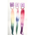 Long straight synthetic hair strands; Ombre pastel and bright rainbow colours; Fine iridescent tinsel-like strands mixed in; Hair attached to a coloured plastic ring; Packaged on a small purple backing card with crown logo;