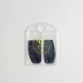 Matte black snap-style hair clips; Pack of multiple clips arranged in two rows; Clear plastic storage case with rounded top; Yellow printed branding and text on front of case;