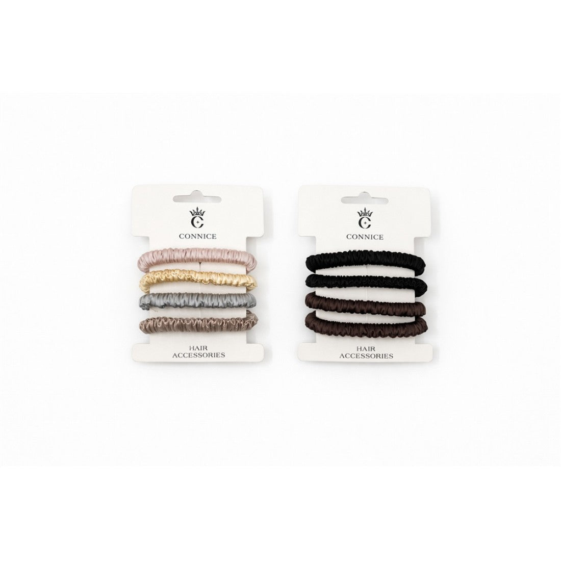 Four slim ruched scrunchies per card; Smooth shiny satin-style fabric; Neutral and dark colour options; Packaged on white CONNICE branded backing card;