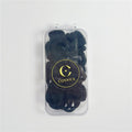 Black fabric-covered elastic hair ties; Compact circular hair tie shape; Clear rectangular plastic case; Gold and black round Connice logo on the case;