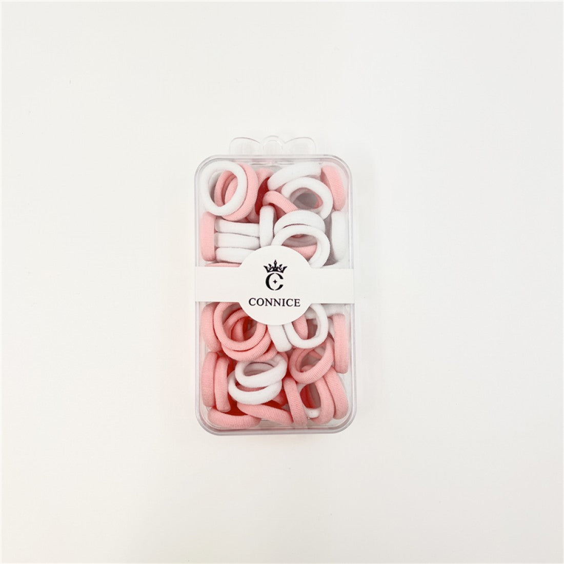 Pink and white small elastic hair ties; Packed in a clear rectangular plastic box; White band label around box with CONNICE logo; Ties appear to have a soft, fabric-covered finish;