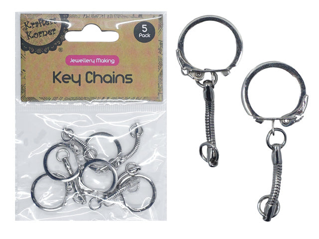 silver coloured metal key chains; coil snake style design; lobster clasp attachment; round key ring; 5 pieces in clear plastic packaging;