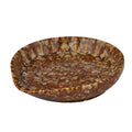 cocoa brown ceramic material; oval shape with raised edges; speckled glaze pattern; approx. 13.3cm wide and 2.5cm deep;