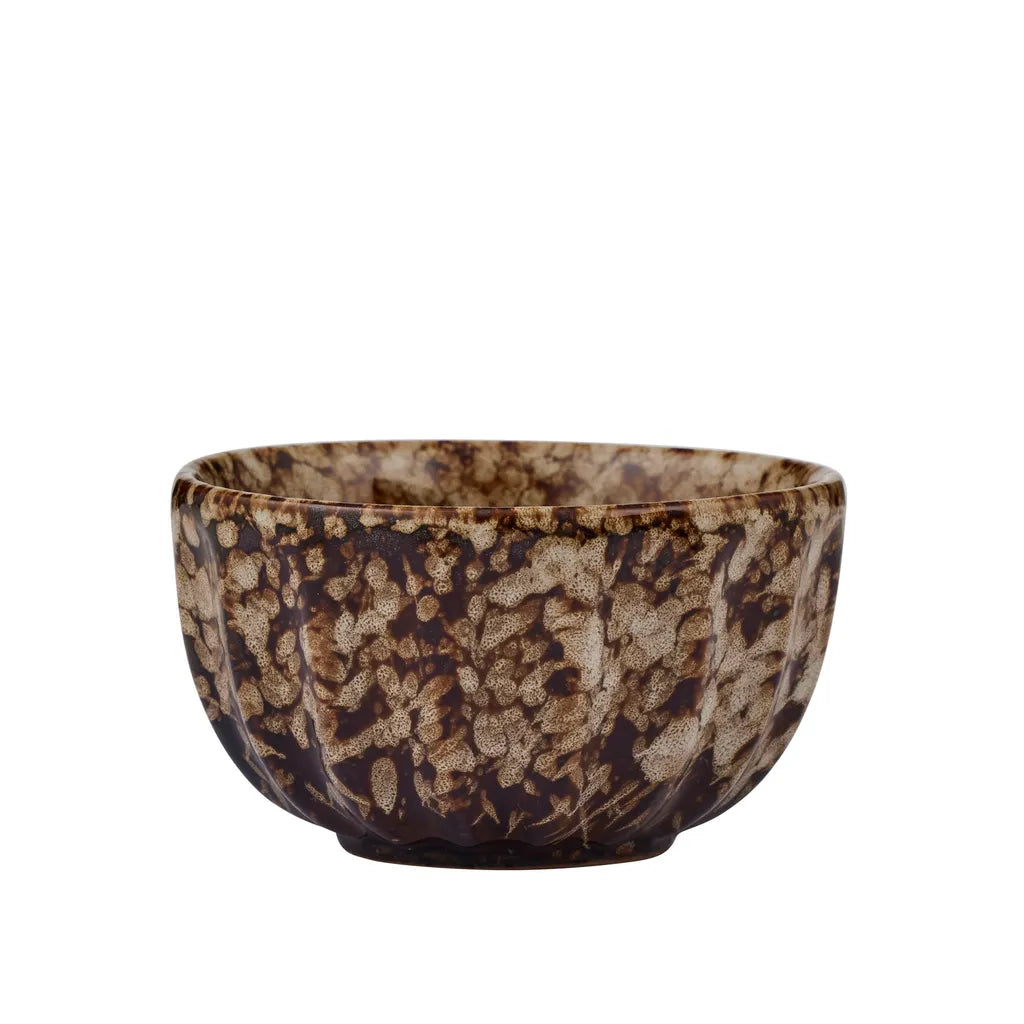 speckled cocoa colour pattern; ceramic material; round shape; 9cm diameter; 5cm height;
