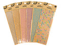 9 strips per pack; teardrop-shaped rhinestones; assorted colours including clear, pink, purple, blue, multi-colour; packaging with Kraft paper backing; adhesive border stickers;