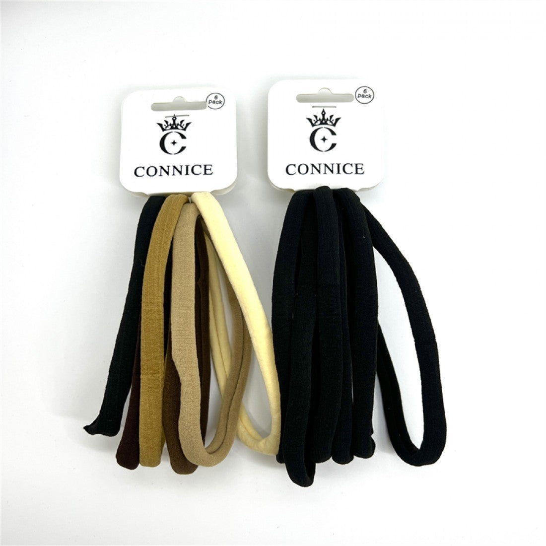 Two hanging card packs each holding six fabric-covered hair ties; One pack in assorted beige and brown tones; One pack in solid black; Flat, thick, tubular band design; Simple white header card with brand text and crown logo;