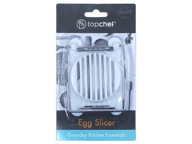 white plastic base; stainless steel slicing wires; compact rectangular shape; packaged on branded cardboard backing; Top Chef logo visible;