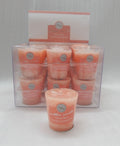 soft velvet rose colour; compact votive shape; label with product name and burn time; packaged in clear plastic box; smooth wax surface;