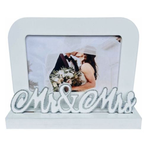 white rectangular frame; holds 6x4 inch photo; attached decorative 'Mr & Mrs' script; sturdy base stand; smooth finish;