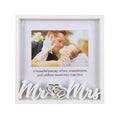 white square metal frame; decorative silver intertwined hearts; Mr Mrs lettering in white; holds 15x10cm photo; glass front cover;