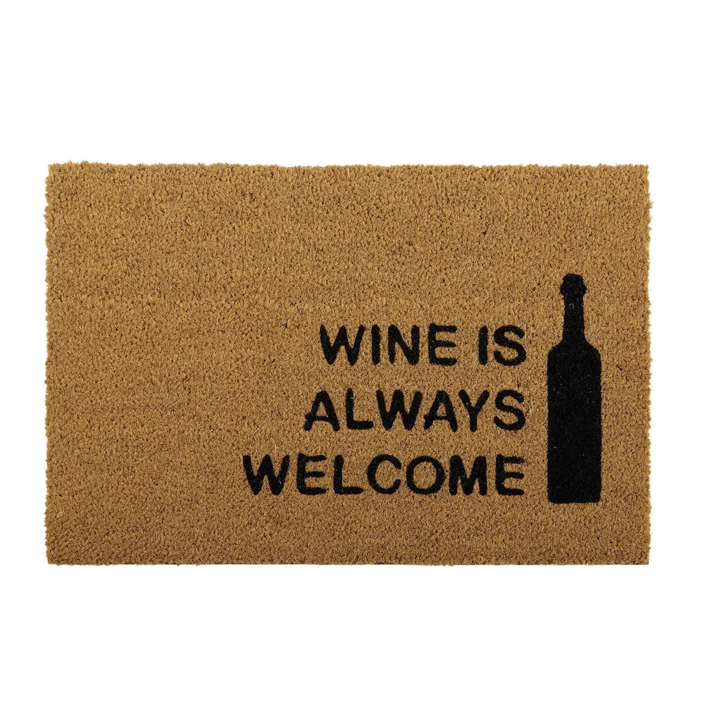 natural light brown coir material; black text 'WINE IS ALWAYS WELCOME'; black wine bottle silhouette; rectangular shape; PVC grey backing visible on reverse side (from image);