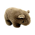 brown plush fur; small rounded ears; black and gold safety eyes; compact wombat shape;